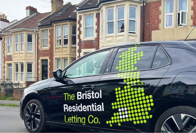 Bristol Residential Letting Company car parked outside terraced houses